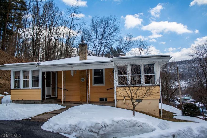 Don't miss this single level, well-maintained Tyrone Borough home on 4.75 acres with incredible views. The house has 3 bedrooms and 2 full bathrooms. Hardwood floors & ceramic tile flow through the main level. The walkout basement is finished with a kitchen, full bath and bonus room/office - a perfect mother-in-law suite. Two car detached garage and separate workshop building with electric. Conveniently located between State College and Altoona close to shopping and I-99. Check out the 3D tour and call the listing agent for a showing today!