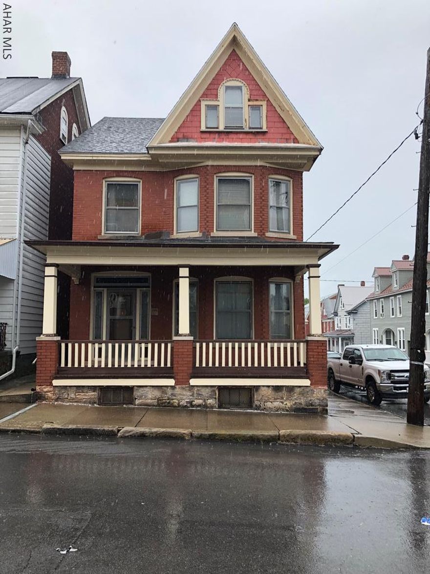 Multiple opportunities for this remarkably maintained & updated 4 bedroom, 2 bathroom home. The kitchen and first floor bathroom were completely remodeled within the last year. Wood trim and pocket doors are original, functioning, and beautiful. Carpet throughout is brand new and interior has new paint. Attic is large and can be used for living space as well.  Rental/mother-in-law suite unit above the detached 2 car garage has 2 nice sized bedrooms, eat-in kitchen, full bath, and living room. Live in this large brick home and have your mortgage paid by the tenant! Multiple opportunities with this property-- must see the appreciate the potential opportunities! NEW PRICE!!