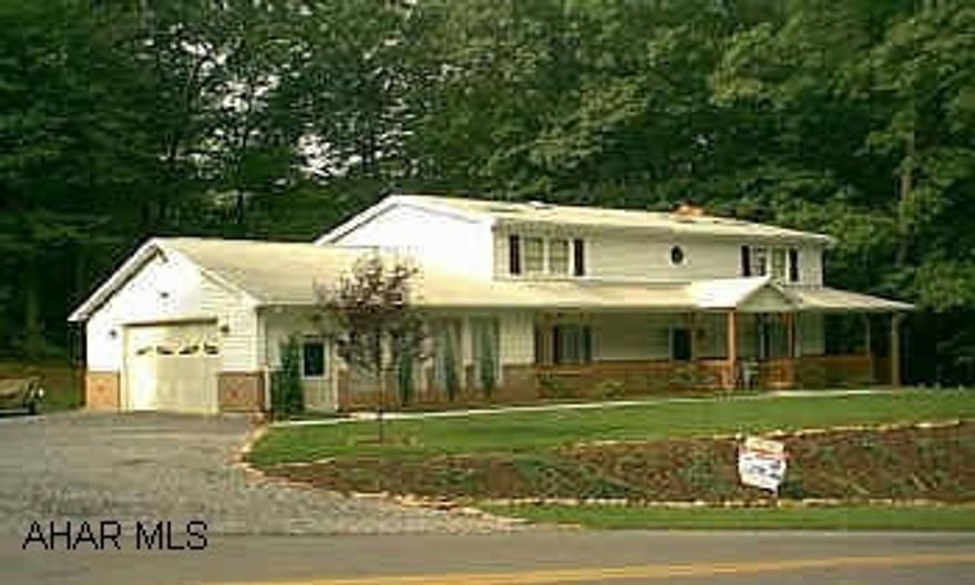 F/DR, 1st Fl. Fam. Rm w/stone FP, 1/2 BA, &  Laundry.   Lower Level with Rec. Rm, Wet Bar, 1/2 BA, &  Workshop.  C/Air & Vac,  Elec. Storage Heat Units, 2/C Gar, Deck, Shed, Oak Flrs and Trim,  Ceramic tile in Kit and BA's, Cathedral Ceilings, Skylights. Logan Twp. - Wooded Setting - 4 BR, 2 Full Baths, 2 Half Baths, LR, Eat-In- Kit, Formal DR,  1st Fl. Family Rm with Stone FP, 1/2 BA, and Laundry.  Finished Lower Level with Rec. Rm, Wet Bar, 1/2 BA and Workshop.  Elec. Storage Heat Units, 2/Car Gar, Deck, Shed, C/Air and Vac, Oak Hardwood Floors and trim, Ceramic Tile Floors, Cathedral Ceilings, Skylights, and  NEW Roof.