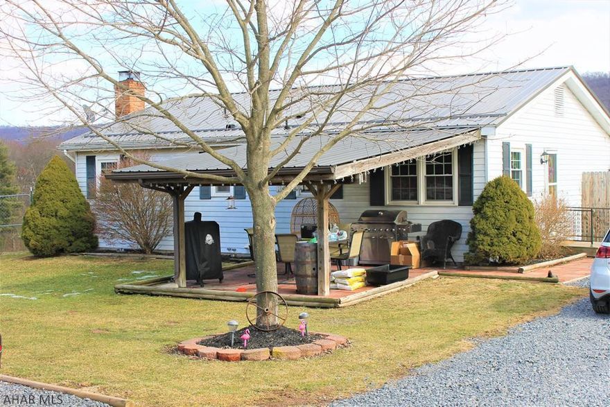 If you're looking for beautiful views and room to roam this is the home for you!!!  This 3-bedroom home sits on over 41 acres!  The main floor features a cozy living room with amazing views   while the recently updated kitchen features new countertops just installed.  All 3 bedrooms feature their own baseboard heat and spacious closets while the bathroom offers a laundry chute to make those household chores a little easier.  Downstairs features a newly finished family room with a large built-in entertainment center that offers tons of storage along with a new full bathroom.  Outside you will find a partially fenced yard, shed and detached garage.  This property has a fenced pasture with watering hole and open fields with plenty of room to expand!  Call today before this one gets away!