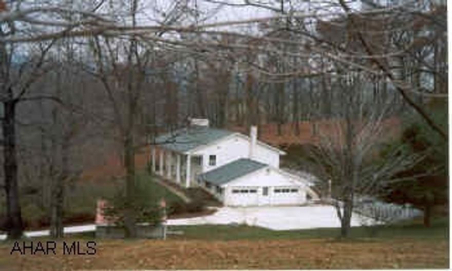Beautiful Bi-Level on 2.168 Acres, 4BR, 3BA, LR, DR, Kitchen, Family Rm, Rec Rm, Office, 2-Fireplaces, Hardwood & Cermic Floors, Security Systems, Skylights, Generator, Cement Driveway,16X20 Sunroom. Private.