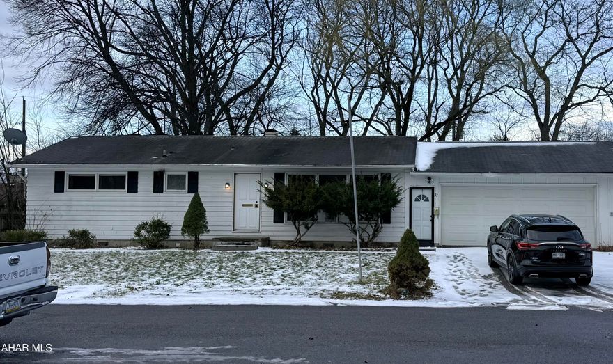 One Story home located on a dead end street....needs some TLC.  Offering 3 bedrooms, 1 bath, HW floors.  Level lot...bonus is the 2 car attached garage....