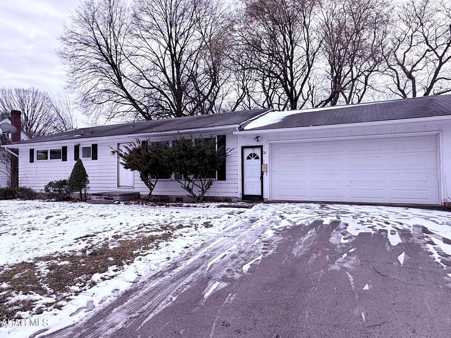 One Story home located on a dead end street....needs some TLC.  Offering 3 bedrooms, 1.5 bath, HW floors. Private  level lot...2 car attached garage....eating area in kitchen. Super location.