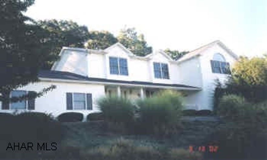 HLBG/FRANKSTOWN TOWNSHIP WITH BREAKTAKING VIEWS OF SCOTCH VALLEY.  HLBG/FRANKSTOWN TWP.  1.5 ACRES WITH MAGNIFICENT VIEWS OF SCOTCH VALLEY.  4 BEDROOM, 2.5 BATH WITH ALL THE AMENITIES.  SPACIOUS ROOMS EACH WITH GORGEOUS VIEWS.  TOTALLY UPDATED IN 1995.  ALL MECHANICS UPDATED.  BACK UP ELECTRICAL HEAT.