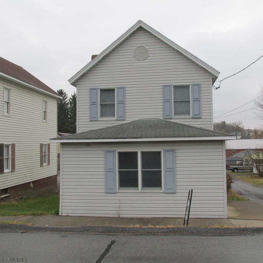 Cute 2 bedroom on a corner lot. In need of TLC. 1st floor laundry. 1 car detached garage. back deck