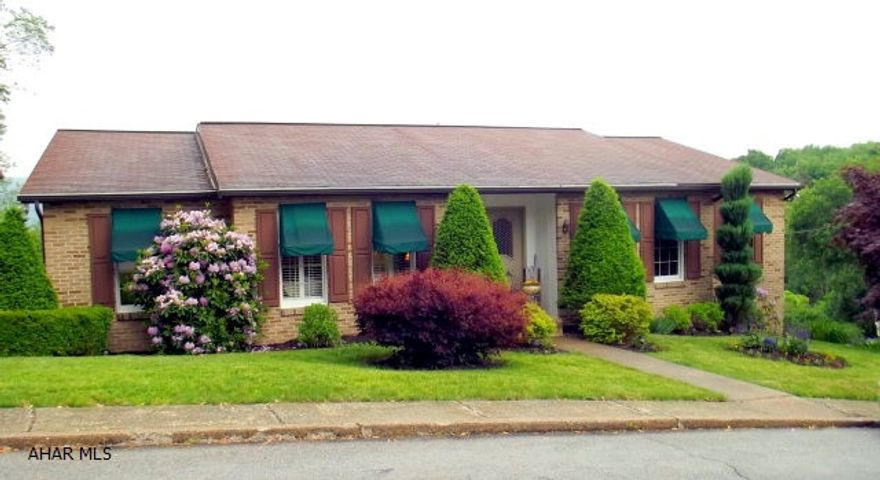 Meticulously maintained one story brick home in Fairview. Spacious  Plastered walls  Sun room has beautiful view of the city. Two familyrooms each with gas fireplace. above ground pool with maintenance free deck. Large two stall intregal garage