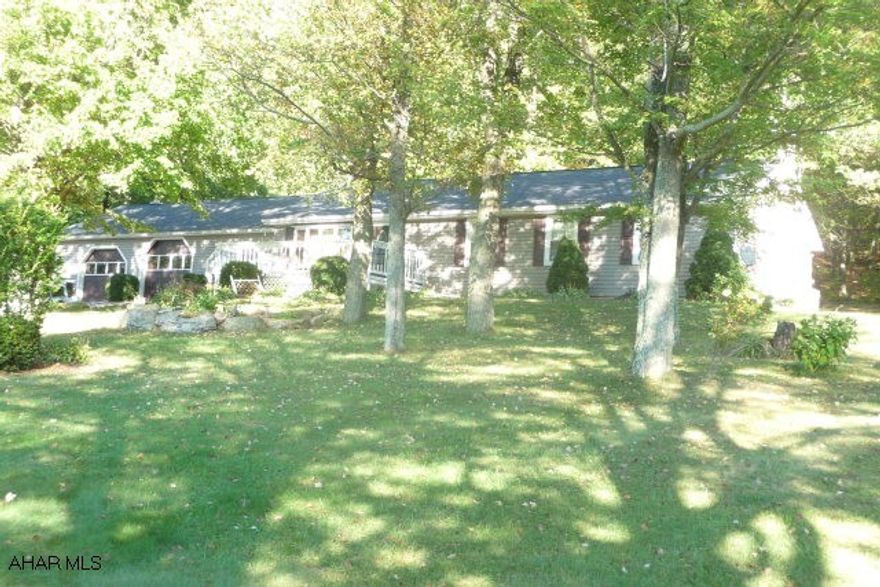 Nice 3BR/2BA ranch home on 3.23 park like acres with great view and only 5 minutes from Bedford. This home includes a new kitchen, large living room & dining rooms, a mstr. suite BR/BA, family room w/wood/coal stove, play room and laundry. The property includes two patios (17'6x20'6 & 11'x50' covered) a 10'x26' deck, 3-car attached garage, mature shade trees, an ornamental pond, large 12'x24'storage shed, a 24' above ground pool, a large yard w/extensive plantings and more.