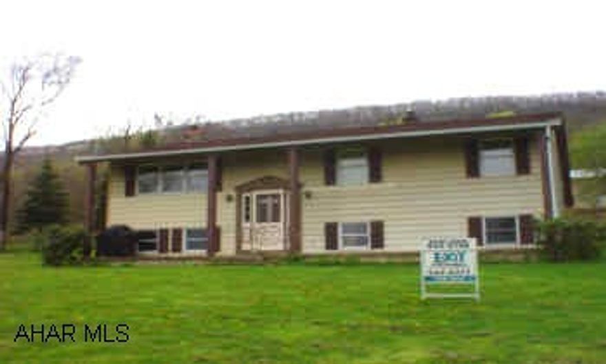 Main level has new flooring and is freshly painted. Large eat-in kitchen, private setting, great view!