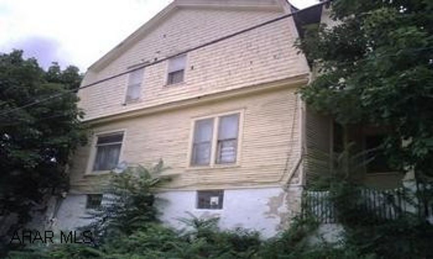 Great neighborhood, house needs a lot of TLC.  Front steps need fixed to comply with codes.  Home has other deficiencies.  Call listing agent for details. Great neighborhood, house needs a lot of TLC.  Front steps need fixed to comply with codes.  Home has other deficiencies.  Call listing agent for details.