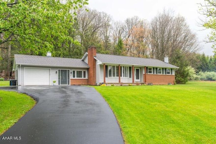 Welcome to 2280 Kettle Road--where privacy meets convenience just minutes from Altoona. Tucked behind a row of
pine trees, this charming 3-bedroom, 2.5-bath ranch welcomes you with a peaceful, secluded feel from the moment
you pull into the driveway. Step inside to a spacious bonus room currently used as a dining area--perfect for hosting gatherings or reimagining to suit your lifestyle. Just a few steps away, the eat-in kitchen shines with granite countertops, open shelving, and a stylish barn door pantry that adds both character and function. Beautiful hardwood floors flow throughout the main level, making maintenance a breeze. The inviting living room features built-in shelving and a cozy wood-burning fireplace--ideal for relaxing on chilly winter evenings. A
convenient half bath sits just off the living room, while down the hall you'll find a full bath and three generously sized
bedrooms. Head downstairs to discover a stunning finished basement with luxury vinyl flooring throughout. This versatile space includes a laundry/utility room, two bonus rooms one currently used as a guest bedroom and the other as an office, a full bathroom with a sleek glass shower and a spacious family room with a pellet stove. Out back, unwind in the heated sunroom that opens to a stamped concrete patio--perfect for entertaining or simply soaking in the serenity. The expansive 3.66-acre property offers a beautiful mix of open space and wooded areas, creating a peaceful setting where you can enjoy nature and local wildlife.
Located in the desirable Sinking Valley area, this home offers the perfect blend of comfort, charm, and privacy.
Opportunities like this don't come around often--schedule your showing today before it's gone!