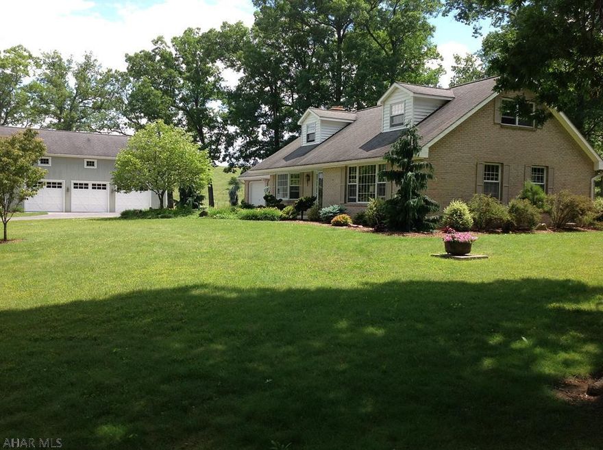 Looking for a piece of paradise in Bedford County, PA - look no further!  This immaculate 3BR, 4BA spacious Cape Cod is a forever home.  This home sits on 10.7 beautiful acres and has privacy galore, but still close to downtown Schellsburg & Bedford.  Just to add to property is a fabulous 3 bay garage with ample space and has heat & electric.  Upstairs is finished and at the present time is a gym.  This space could be many things.  Also on property is a stream & pond to watch the abundance of wildlife.  This property is a must see and won't disappoint!
