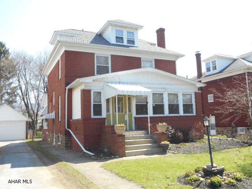 Spacious all brick home with 3 bedrms, l.5 baths.Finished 3rd floor with lots of storage.Lovely hardwood floors and trim.  Built-in cabinetry between dining  and living rm. Living rm with brick fireplace and lovely stain glass windows on either side. Kitchen with pantry and breakfast nook. Sun room with lots of windows and heated.   Large fenced-in yard. l car integral garage and carport. Conveniently located to schools and mall. Home Warranty.