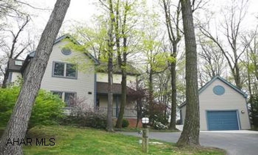 THIS CONTEMPORARY HOME IS NESTLED ON A PRIVATE, WOODED LOT IN CHAPEL HILL ESTATES. NEWLY BUILT GARAGE WITH STORAGE LOFT. THIS CONTEMPORARY HOME IS NESTLED ON A PRIVATE, WOODED LOT IN CHAPEL HILL ESTATES. NEWLY BUILT GARAGE WITH STORAGE LOFT.