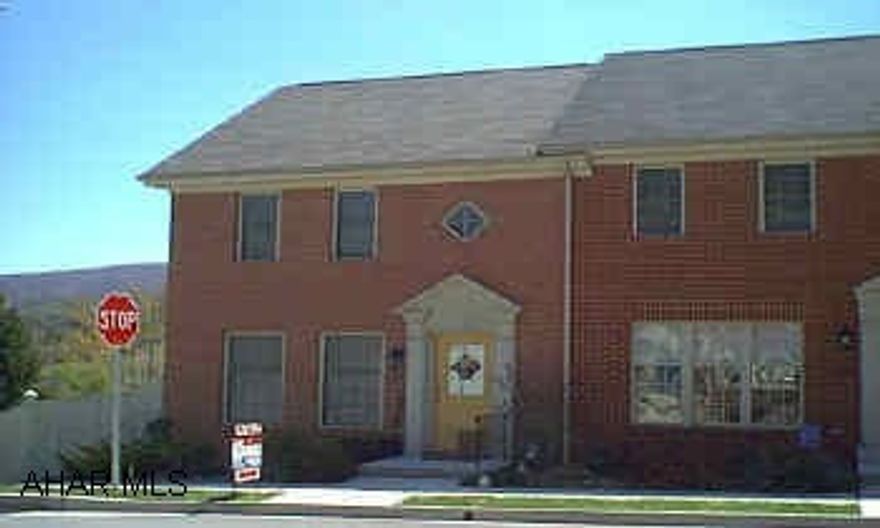 End unit- some landscaping-Interior newly painted sprinkler system front and back- New Carpet - Living Room