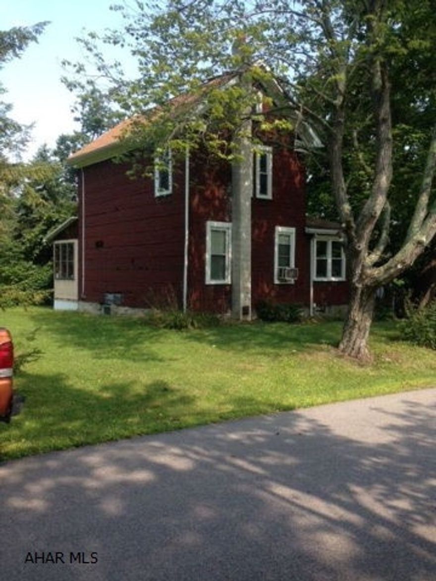A good first time buyer or flip. Nice location on quiet dead end street block. Outbuilding. Newer roof, windows, furnace and electric. Everything else needs done. Lots of cosmetic work needed.