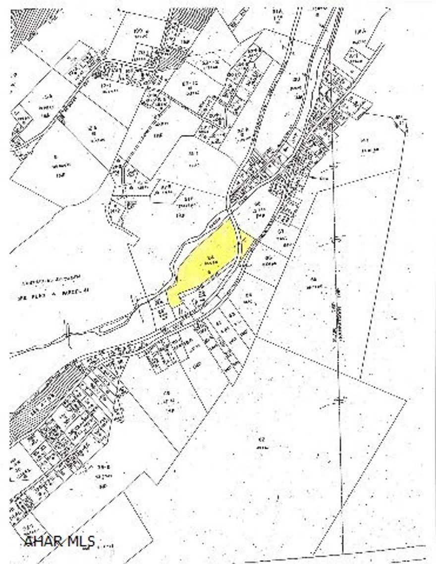 Unimproved acreage along Resevoir Road. No well or septic. Much of acreage is in the 100 year flood zone.