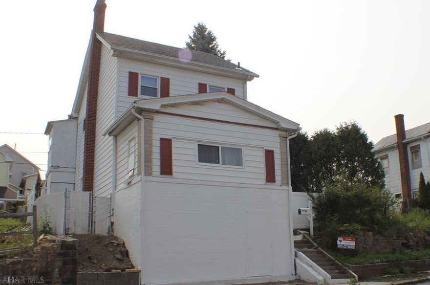 Three Bedroom home with finished attic & bonus room.  The property has double lot.  It also includes 2 garage and off street parking in the rear.  Taxes and square footage need to be validated.  No commission paid to sellers assist.