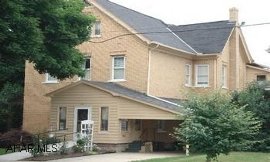 This large two story, 2 unit, brick home, located in town, has all of theamenities.  Each unit has 2 bedrooms,a large living area with bay windows, and aspacious kitchen.  High ceilings, new style windows and impeccably maintained woodworkingfill this This large two story, 2 unit, brick home, located in town, has all of theamenities.  Each unit has 2 bedrooms,a large living area with bay windows, and aspacious kitchen.  High ceilings, new style windows and impeccably maintained woodworkingfill this 3000+sq. ft. home.  With little work this multi-unit could be returnedto a distinguished single family home, with the character and class of yesteryear.