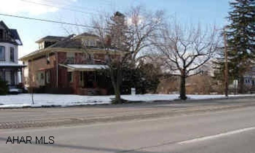 LARGE HOME. VERY LARGE BRICK HOME WITH LOTS OF CHARM.  BEAUTIFUL WOODWORK, SPACIOUS ROOM.