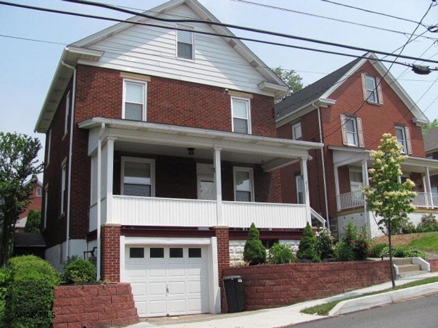 Ebensburg- Freshly painted interior! 2  story brick & aluminum sided home featuring 3+ BRs, large eat-in kitchen, newer windows, roof & 100 amp breaker service.Hardwood floors in foyer & LR.  Large front porch and 1 car integral garage. Great curb appeal! Closing cost assistance available.
