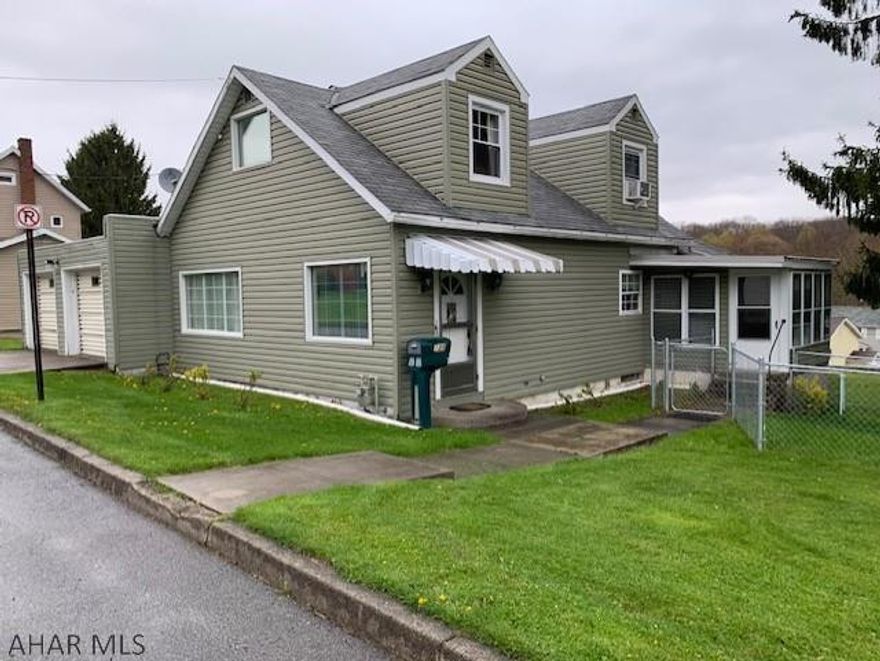 Charming 3 BR Cape Cod on a double lot with enclosed pavilion, gazebo and 2 car garage! this home boasts remodeled kitchen, flooring and vinyl siding.  Picture windows and fenced enclosure off sunporch. This is a MUST SEE!