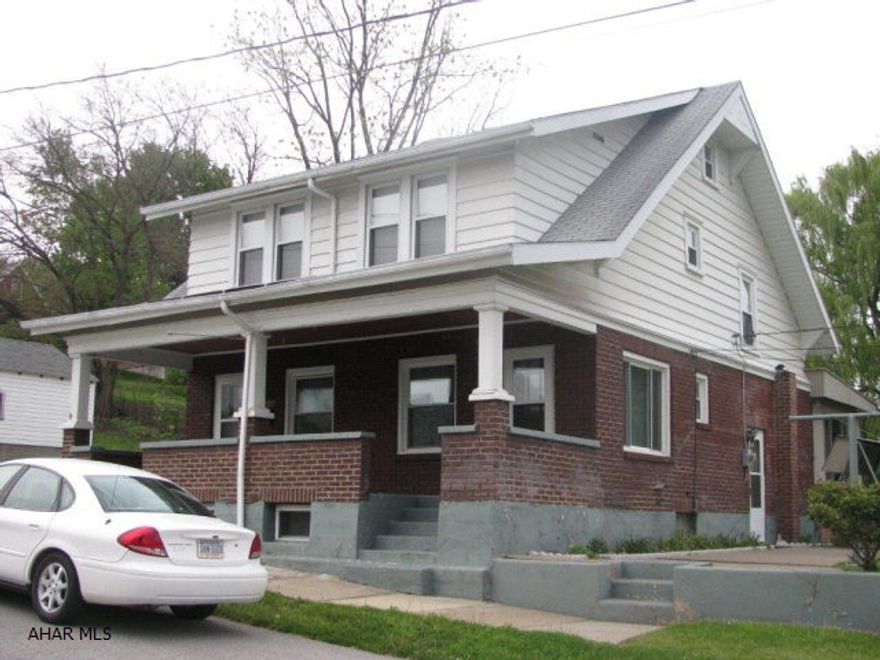 Adorable Brick 2 1/2 story Tyrone home! LR., den, bonus room, lg EIK.w/snack bar, 4 bedrooms, 1 full & 1 half bath, attached carport and large front porch to enjoy summer evenings! Ready to move in!
