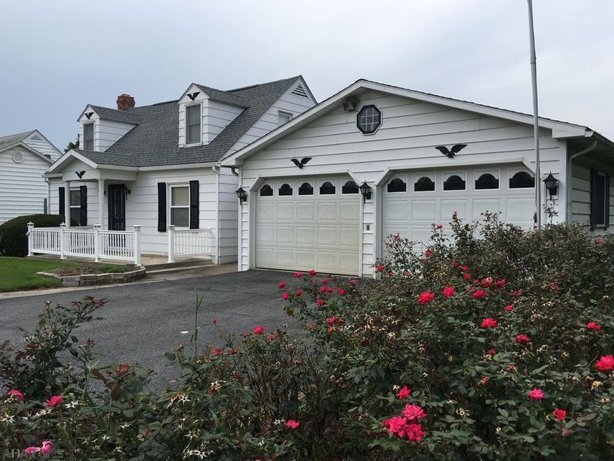 Well Maintained, Cape Cod 2 story home with 3 bedrooms, 2 full baths, breezeway, and 2 car oversized garage with electric and water. Features: Real oak floors under laminate floors, Central Air, Bedroom/Bonus room main floor, Main Floor Laundry,  New Oil  Furnace, New water softner and hot water tank, newer vinyl windows, breezeway and screen in porch. Vinyl handrails and trex decking.  Large back yard with a 12x16 storage shed and additional parking in the back. Close to downtown Everett.