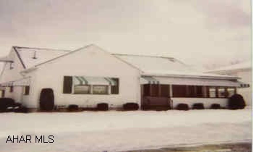 1.5 STORY VINYL SIDED HOME VERY NICE CAPE COD, LARGE OPEN KITCHEN, ENCLOSED SUNPORCH OFF KITCHEN, FINISHED ROOMS IN BASEMENT, NEWER ROOF, CENTRAL AIR, HW FLOORS - CARPET, EXCLUSION TIL JANUARY 1,2002.