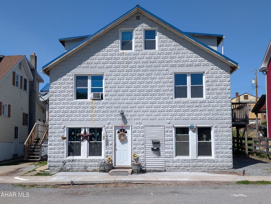 Attention Investors! This three unit apartment building is unique in that two units have multiple stories and multiple baths, one unit having four bedrooms and the other three. The first floor unit has three bedrooms and one bath. All apartments have their own laundry. Tenants pay electric and heat. Seller pays water & sewage, garbage and electric for small utility room. There is a nice back yard and one off street parking space and plenty of on street parking. Call to get more details and schedule your tour of this money maker.