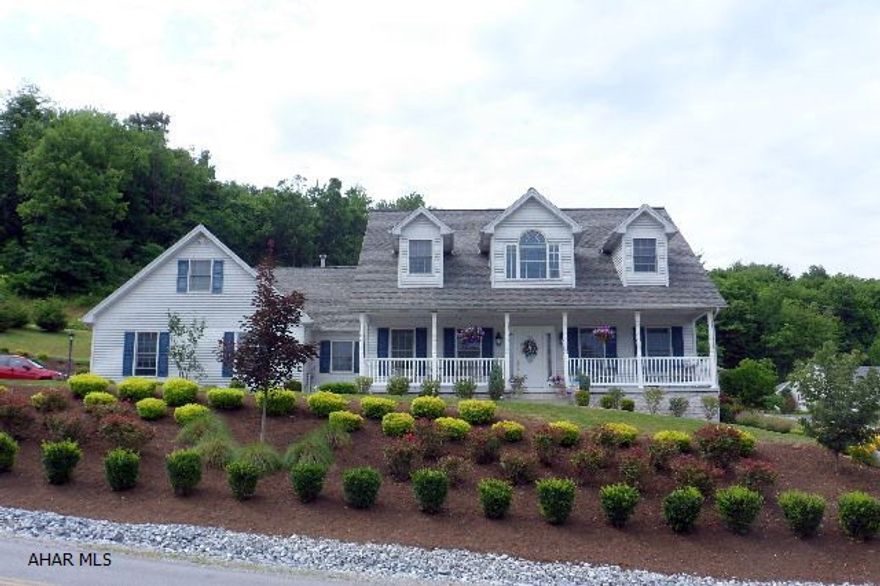 Exquisite Custom Built Home - 1-1/2 Story - Superior Craftsmanship - Supreme Living - 246 Castle Farms Road - 4BR, 3.5 BA, LR w/gas FP, Formal DR, (LR & DR separated by arched column divider), Oak kitchen with island and eating area, French doors open to a large patio.  First floor laundry and M/BR w/ private BA and w-in-closet.  Beautiful hardwood floors in LR, DR, M/BR, and Foyer.  Finished basement has FR, private BR and BA, den/office, ample storage, and additional access to garage.  Bonus room over garage could be 5th BR or playroom, central air, 4-zone GHW, heated 2.5 car garage, front and rear shale area for extra parking, professional landscaping, Logan Twp, Campus Area.......$299,900.