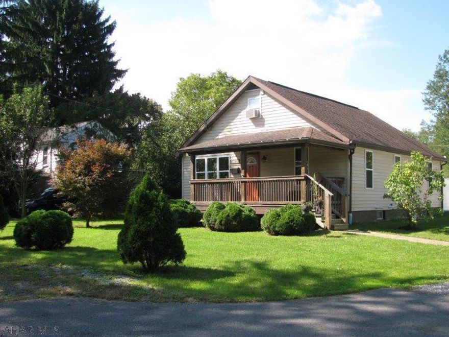 Updated vinyl sided Bellwood home! Spacious 23x14 living room. Updated kitchen w/ appliances, 2 full baths and 2 bedrooms. Covered front porch, patio, & 2nd floor deck for outdoor living! 24x16 detached garage all on a spacious lot.