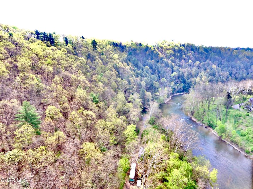 35+/- acres with 2000'+/- of frontage on the Juniata River. The property offers a great building site overlooking the River with a new septic system (Sand Mound) and well. It would also make a great location to park a camper or pitch a tent with a nice path down to the River to enjoy fishing and swimming. Tons of outdoor activities can be enjoyed on the property such as hunting, camping, hiking, rock climbing, fishing, swimming, and canoeing. On top of the ridge of the property you will find a small hunting cabin offering a great view upriver. Located minutes from Breezewood with easy access to the PA Turnpike and I-70.