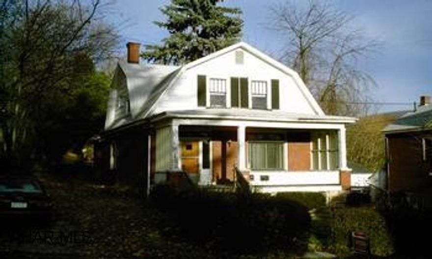 Handyman Special - Needs Renovated - Sold AS IS Originally single family home/duplex. Should be single family again.