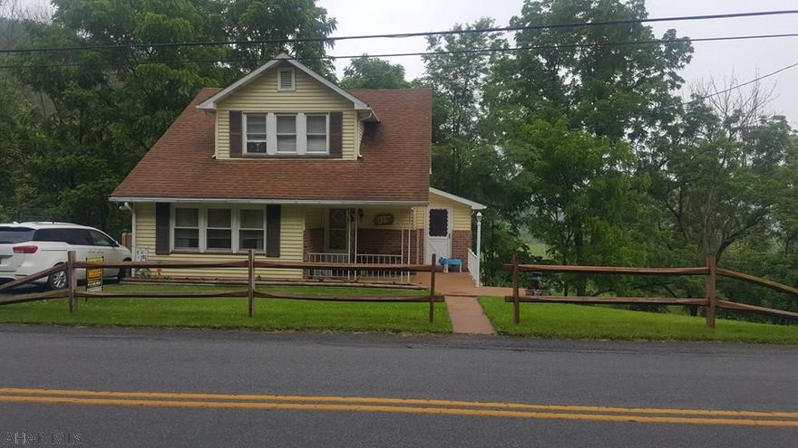 What a darling house! This great  2 bedroom house has so many updates! The kitchen has glass tile backsplash and stainless steel appliances. The house has all new modern flooring throughout. Go upstairs and feel like you are in a high end hotel and soak in the large tub.  Enjoy the pristine 1.1 acres of land on a hot summer night.  This house is ready for you to move in!