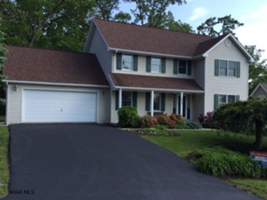 Charming and cozy, move right in to this spacious 4 Bedroom 2 story home in Chapel Hill Estates.  Terrific 2 story built by Glenn Fry Construction 1994, Lg Rooms, Level lot.  Easy living, convenient location, Altoona Schools - Enjoy the private wooded back yard.  Two systems, Gas Hot water heat and central air, neutral carpet, good condition, roof 2008, furnace has 5 zones, high efficient, low bills.  Low taxes, low maintenance. House exterior has been power washed, new shutters installed, deck stained.  Carpet will be cleaned for new owner.