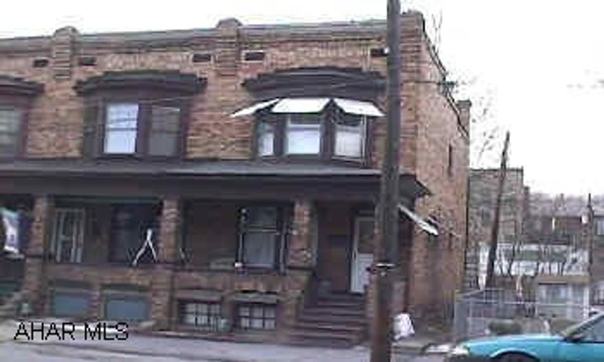 Nice 2 story brick townhouse.  End unit. Downtown Tyrone.  10th Street to Bald Eagle Avenue.  Turn left.  Row houses on the left.