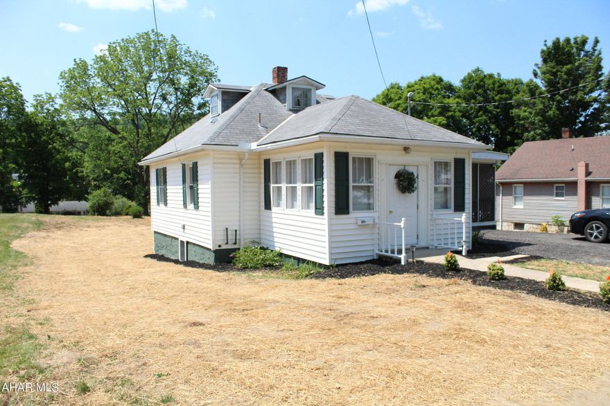 Get it while it's hot! This vinyl cape cod has had a makeover that you don't want to miss! The new shrubs and walkway welcome you into this freshly updated home. A large screened in porch with new roof, fresh paint, electrical outlets, ceiling fan and lots of room for outdoor entertaining! New paint, blinds, carpet and vinyl linoleum throughout the home. New kitchen sink and pub table w/ stools. Safety measures have been taken when entering or exiting the second story half bath. Lateral sewer line is new and approved with the Borough. The basement has new insulation, has been painted and includes the washer, dryer and tub basin. New grass has been planted, new basement and storage doors for security. 2018 water heater, 2017 new sewer lines in the basement. All GFCI outlets near water sources. Driveway has been leveled with millings and expanded for two cars.   Home is walking distance to all downtown shopping and restaurants. This home is a MUST SEE!