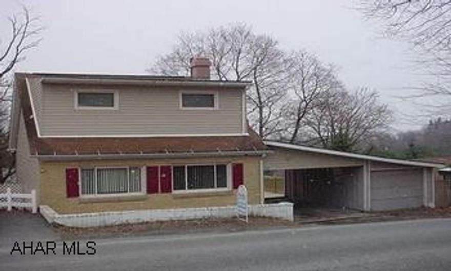 Nice neighborhood..this cozy home has been all remodeled.  Includes new siding, windows, eat-in kitchen, bath, all new flooring, ..Offers a spacious living room w/ woodburning fireplace, 1st floor laundry, 1 car garage and carport.  Fenced yard and new large deck.