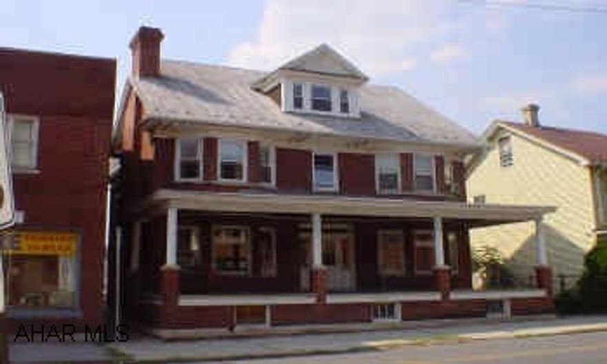 4 bedroom brick, metal roof, 2 living rooms, new thermopane windows on 2nd & 3rd floor, new back porch, fire escape, off-street parking (4-6 cars). Could be single family residence, group home, offices, or other varied uses.