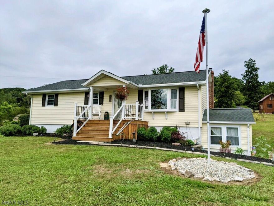Situated on a peaceful 7 acres in the Chestnut Ridge School District this wonderfully maintained 3 bedroom ranch is calling you home!   An extra large 2 car detached garage, 24x32 2 story barn, concrete floor, and an extremely unique "Little House on the Prairie" replica house!   Lovely views of the countryside and plenty of space to garden, or have a few horses.   Come relax and enjoy and make this your new home!