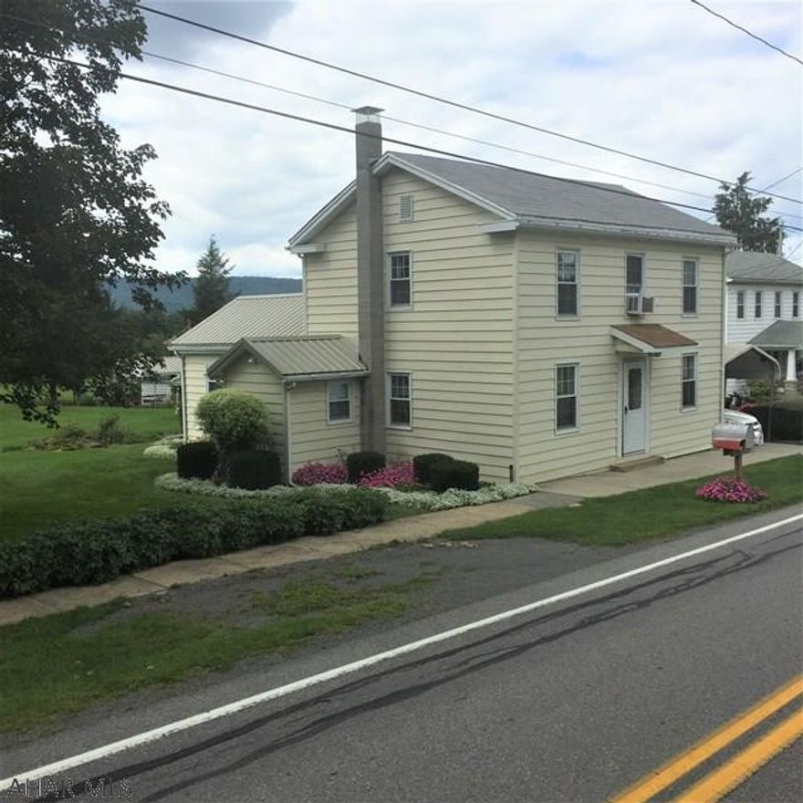 This is a very well kept house in Rainsburg in very good condition and only minutes from State Game Lands, a hunter's paradise.   Taxes are only $177.95.  School tax of $425.96 is covered by the Homestead Act.  Owner has kept up with all repairs.  The lot is level with beautiful landscaping.and extends to the alley.  There is a carport on the right side of the house.  There is a built in porch used for a washer dryer and storage.  The basement also has shelving for storage.  The kitchen was remodeled in 2011 with beautiful oak cabinets and pantry.   This is a great starter home for a couple or small family.  Sign by the mailbox.  Very low maintenance home with nice level lot.