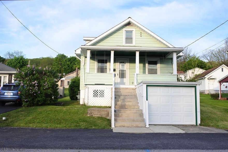 Watch Lakemont fireworks from your porch!  Very well maintained home with flexible floor plan and first floor laundry/mudroom.  Perfect for someone needed a bedroom and bath on the first floor. Updated kitchen, new floor and appliances stay.  This home has good bones.  Close to everything.