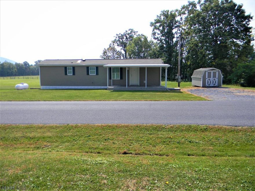 Enjoy country living at its best. This updated single wide is low maintenance home with a view of the country. Enjoy the outside on your own 1.9 acres of level property. Sitting on Front or back porch, the views are spectacular !! This home is very clean and well maintained. All tied down and strapped to columns and to code and inspected!! Come see this property and home soon