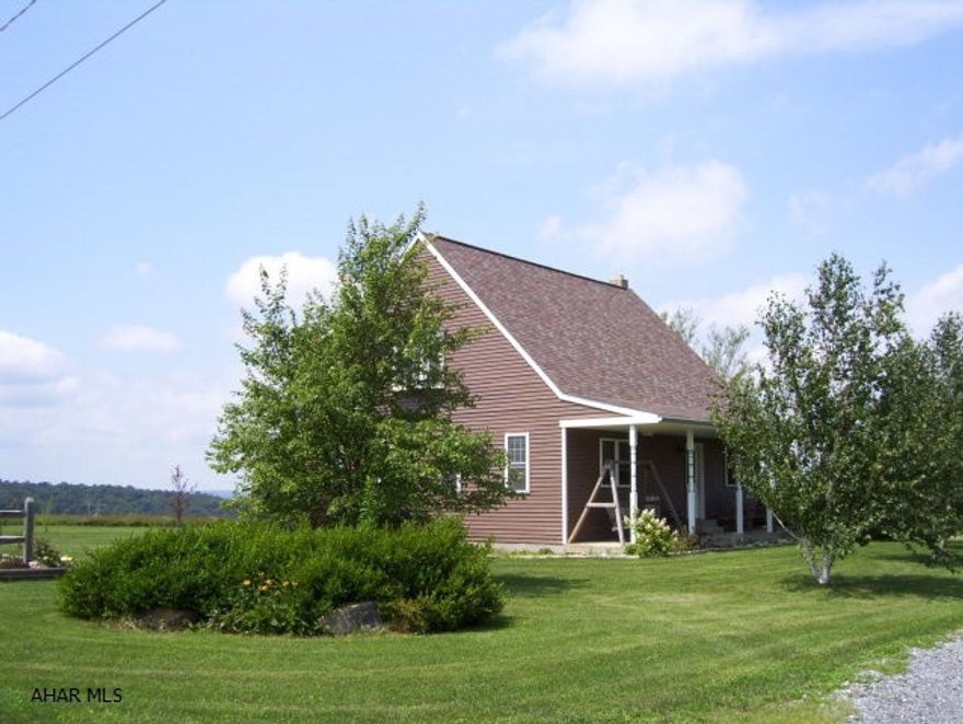 A-M-A-Z-I-N-G!! Remarkable 3 bedroom, 2.5 bath Cape Cod on 10 acres with a spectacular view. Tastefully designed kitchen, new hardwood floors, large basement, tons of storage/closet space, 2 fireplaces, convenient & spacious 1st floor laundry room. I think you found your DREAM HOME!