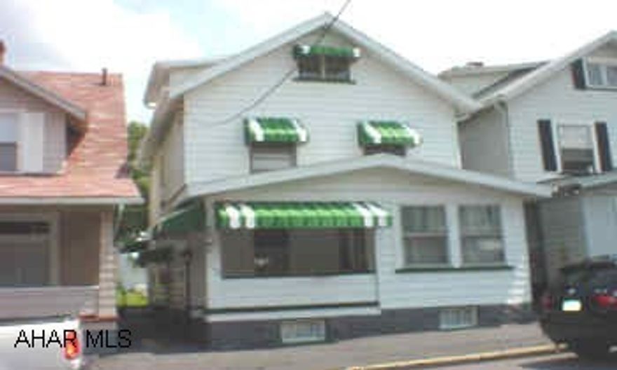 3-4 bedroom home in East End. Features new roof in 2005, all new berber carpet, hardwood under carpet, newer furnace, enclosed rear porch with hardwood floors, 2 car detached garage. Heated 3rd floor could be 4th bedroom. Agent is related to seller.