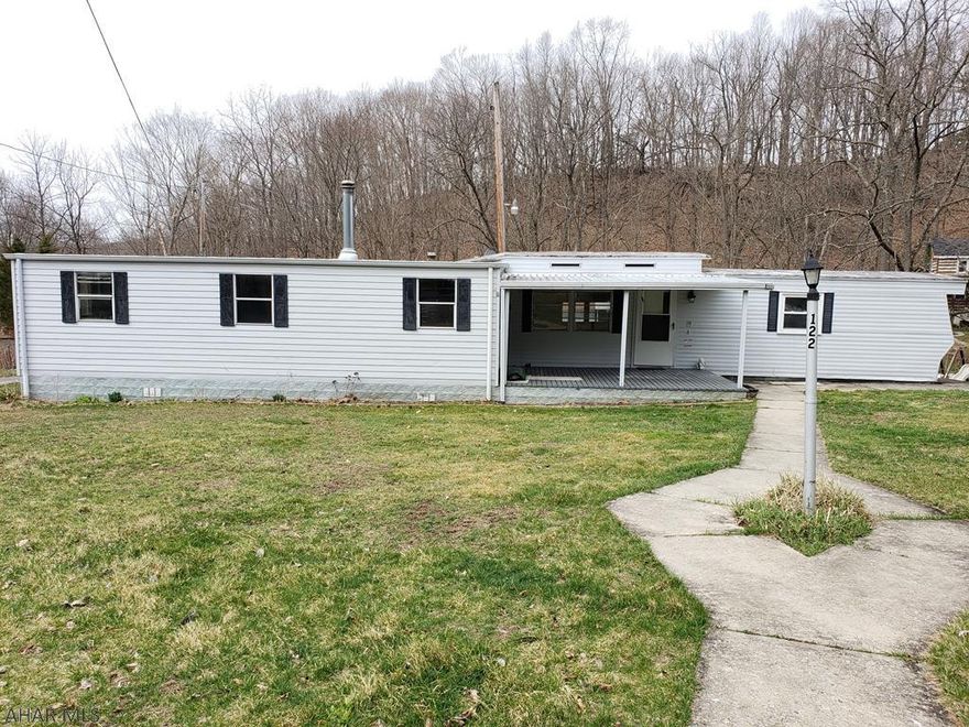 Older, single wide trailer on half an acre in Napier Township.  This property features plenty of room as well as a 24 x 32 - 2 car garage.