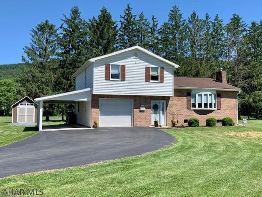 Move in Ready! Updated Multi-Level home on 1.099 acre in Bedford Borough, adjoins the Elks Golf Course. Open foyer to laundry rm w/LG stackable washer/dryer, bedroom/den. Open kitchen/dining/living area, new LG stainless appliances, recess lighting, new cabinetry, pantry, laminate flooring, moveable island. Dining rm features french doors that leads to the covered back deck and a bay window overlooking the golf course and lg. yard. Living rm bay window adds brightness to the freshly paint interior and gas fireplace. Third fl. features 3 bedrooms w/oversize lighted closets, full bath, new floors, and vanity n/more! Master bedroom w/recess lights, new flooring, double lighted closet space and new master bath! Walking distance to town and schools and a 10x10 & 10x16 sheds.