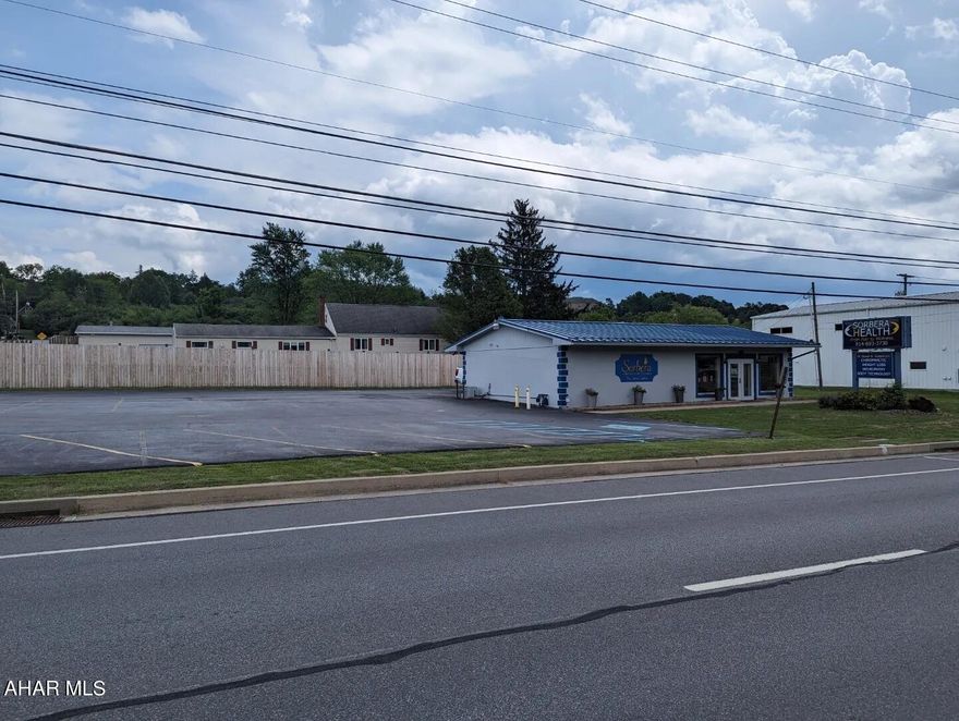 Are you on the hunt for the perfect commercial office space to elevate your business to the next level? Look no further! We are thrilled to present a fantastic opportunity in the heart of Duncansville, where prime real estate meets endless possibilities. Your clients and employees will appreciate the convenience of ample parking spaces, ensuring hassle-free visits. You don't want to miss this rare opportunity to secure a commercial office space that checks all the boxes. Whether you're an established business looking to upgrade or an entrepreneur ready to start a new venture, this property offers endless potential!  Owners are licensed real estate brokers.