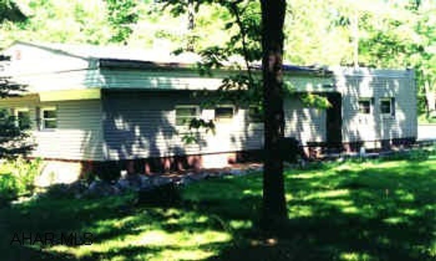 SECLUDED & VERY PRIVATE. 2 CAR DETACHED GARAGE HEATED WITH WORKSHOP. NEW MECHANICS. CALL WALLY 949-2354.