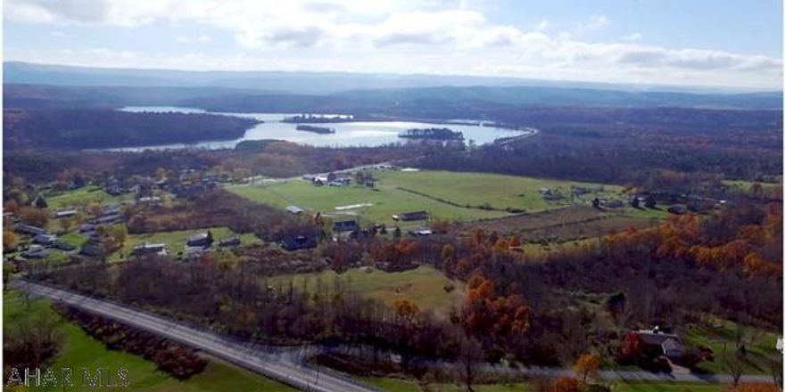 Hard-to-find 3+ acre parcel with remarkable Allegheny Mountains and Shawnee Lake views. Very private land! Public sewer available. To be surveyed. Additional land available. Excellent location, close to Schellsburg and Bedford.